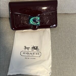 Coach Dark Red Patent Leather Wallet with Blue Clasp